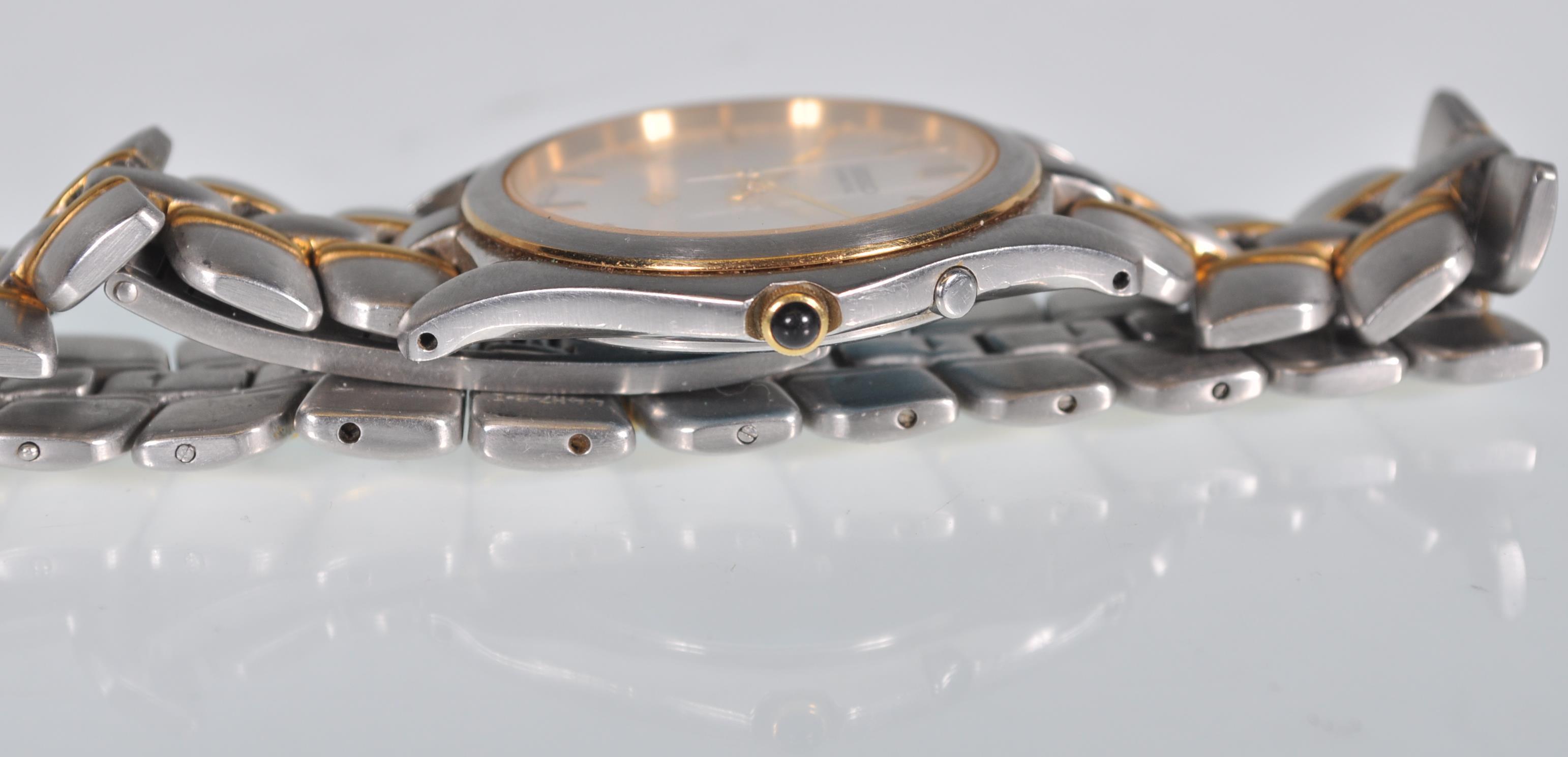 A gents Seiko Kinetic wristwatch having a textured silvered dial with gilt baton markers and hands - Image 2 of 6