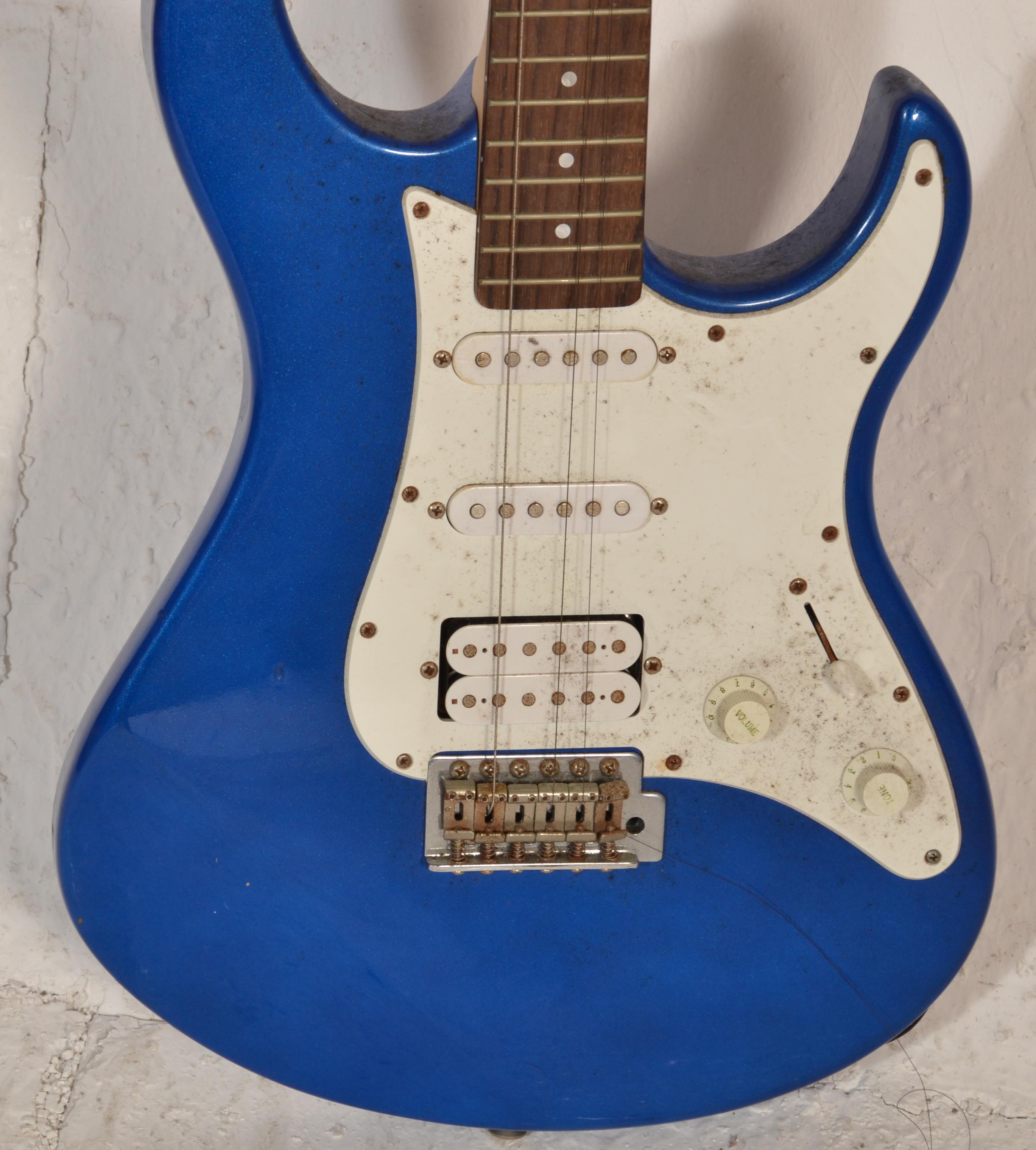 A Yamaha Pacifica stratocaster style electric guitar having a blue painted body with a white - Image 2 of 4