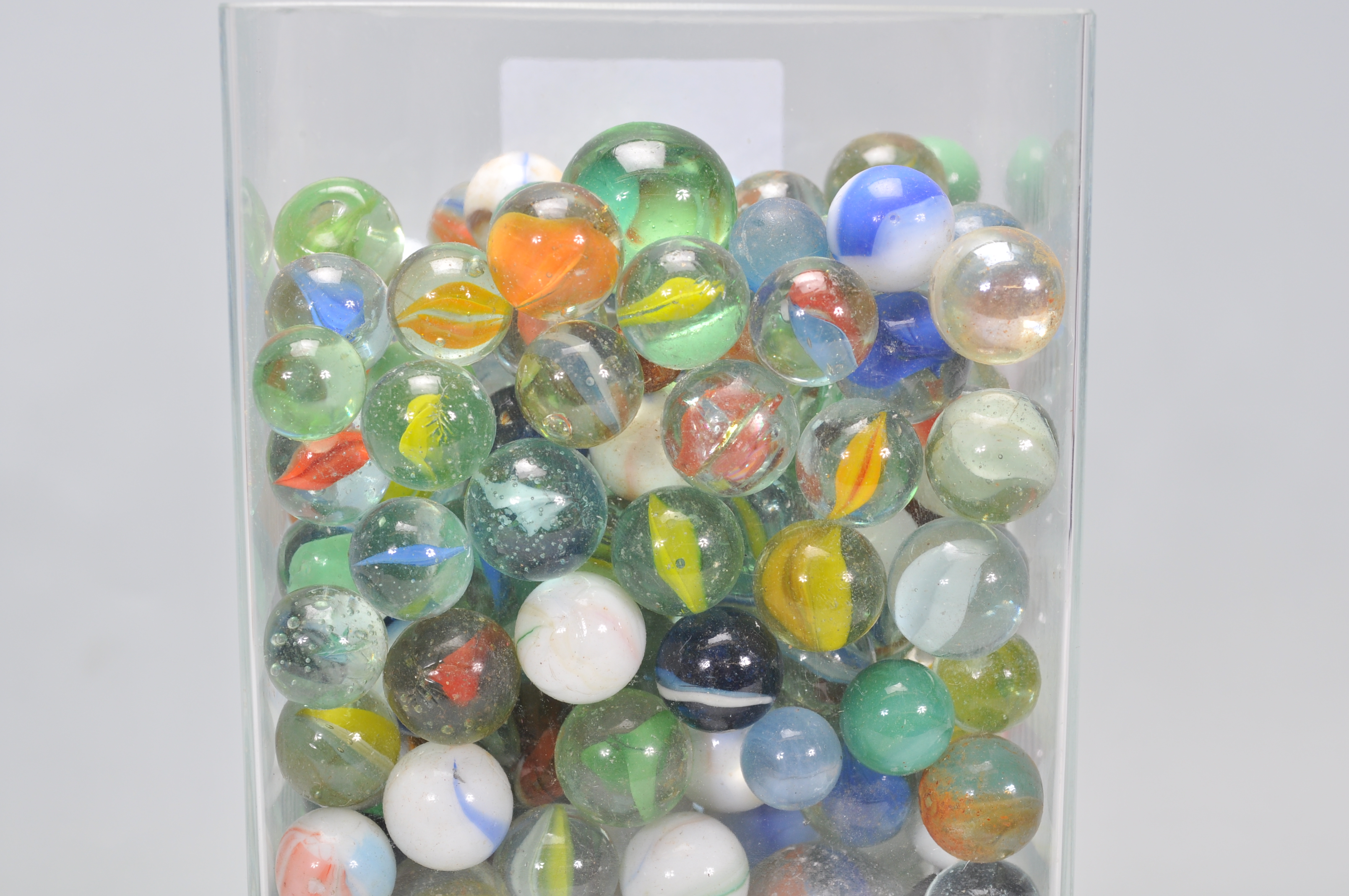 A collection of marbles to include glass cats eye marbles, some white and coloured glass examples, - Image 2 of 11