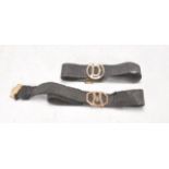 Two 19th Century Victorian mourning bracelets constructed from a black ribbon with a 9ct gold