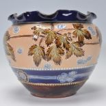 A 19th century Victorian Doulton Lambeth Jardiniere stoneware planter with glazed leaf design with