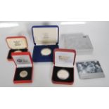 A collection of commemorative coins to include a Elizabeth II 60 years commemorative coin, a