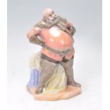 A Royal Doulton ceramic figure entitled 'Falstaff', H.N. 2054. Marks to base. Measures 19cm tall.