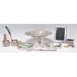 A collection of silver and silver plate ware to include a Britannia silver hallmarked photo frame of