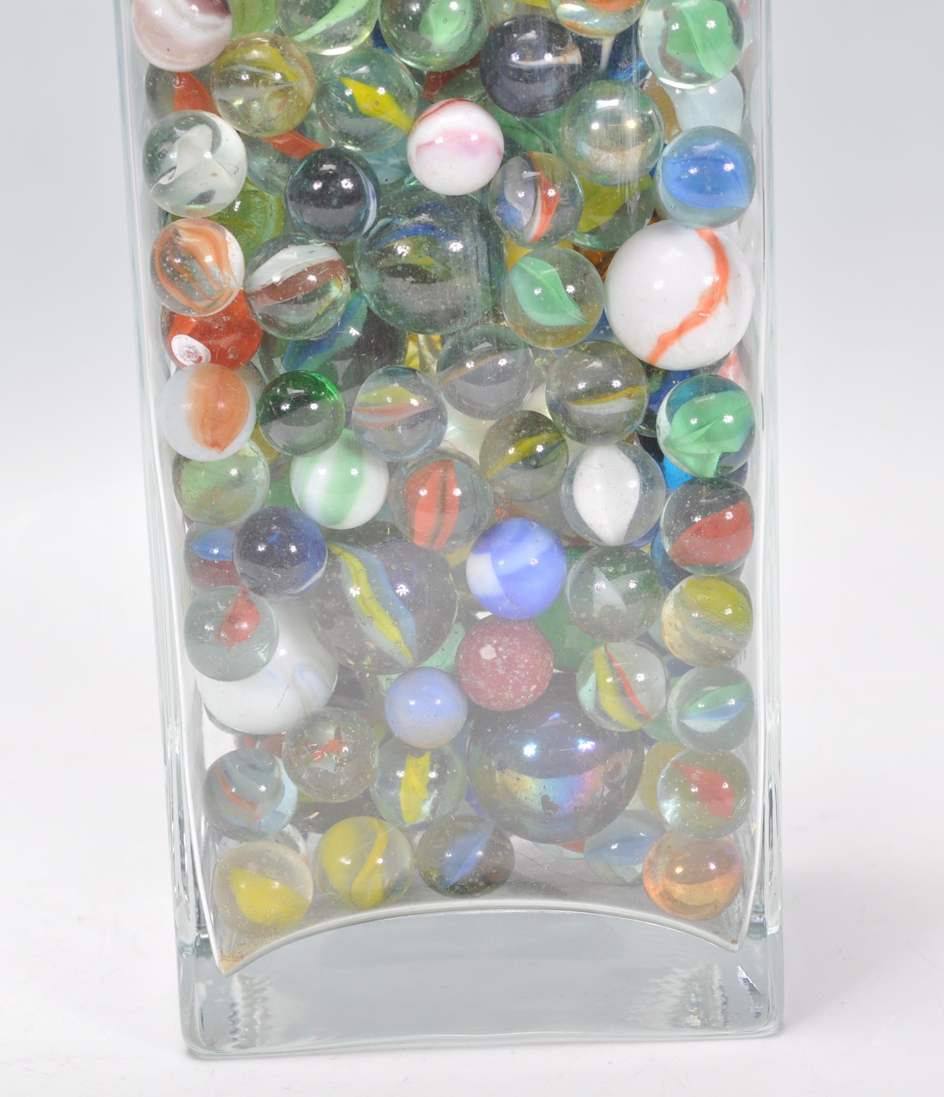 A collection of marbles to include glass cats eye marbles, some white and coloured glass examples, - Image 8 of 11