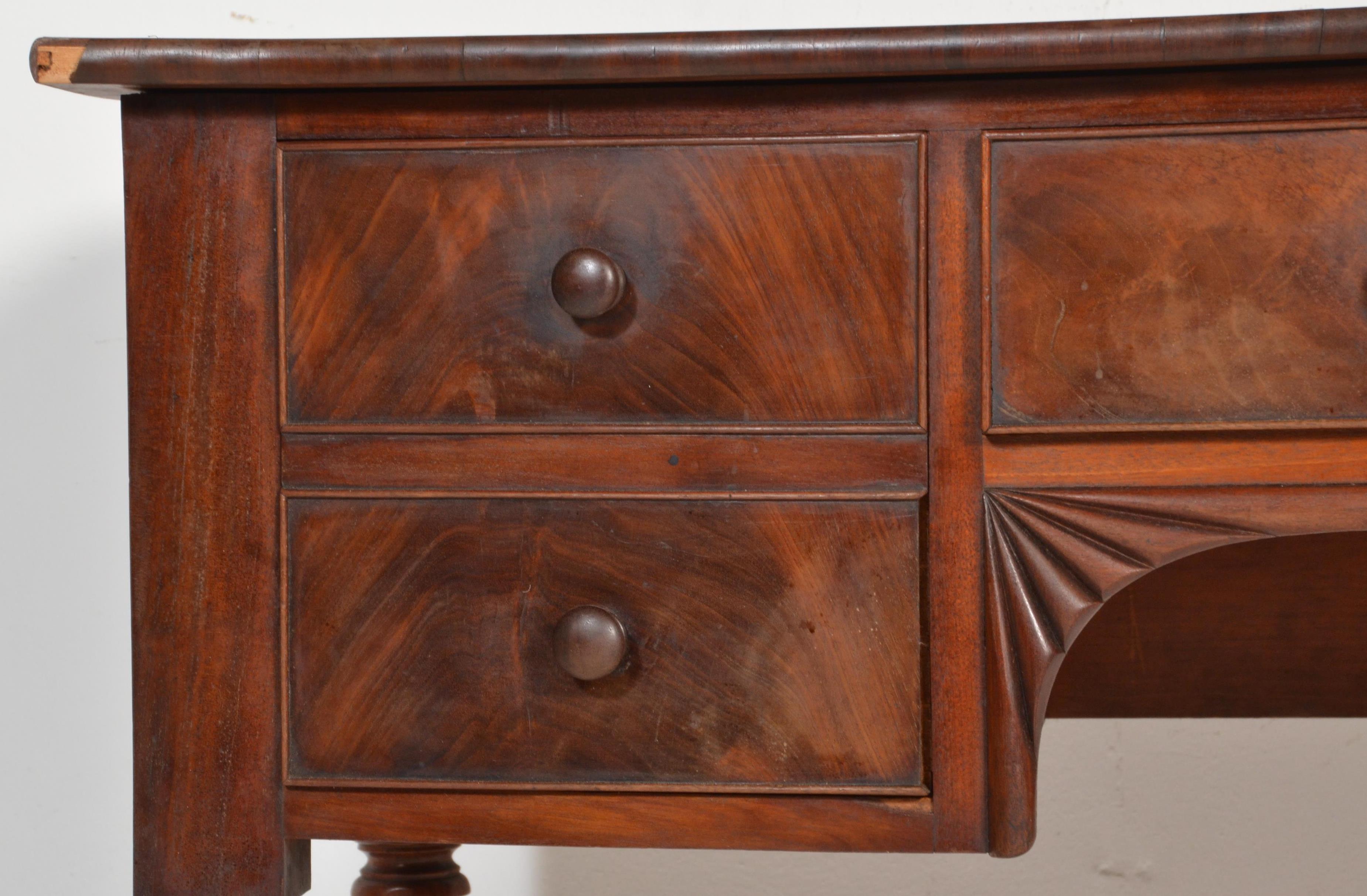 A 19th century George III mahogany bow fronted writing table desk. Raised on bobbin supports - Image 4 of 7
