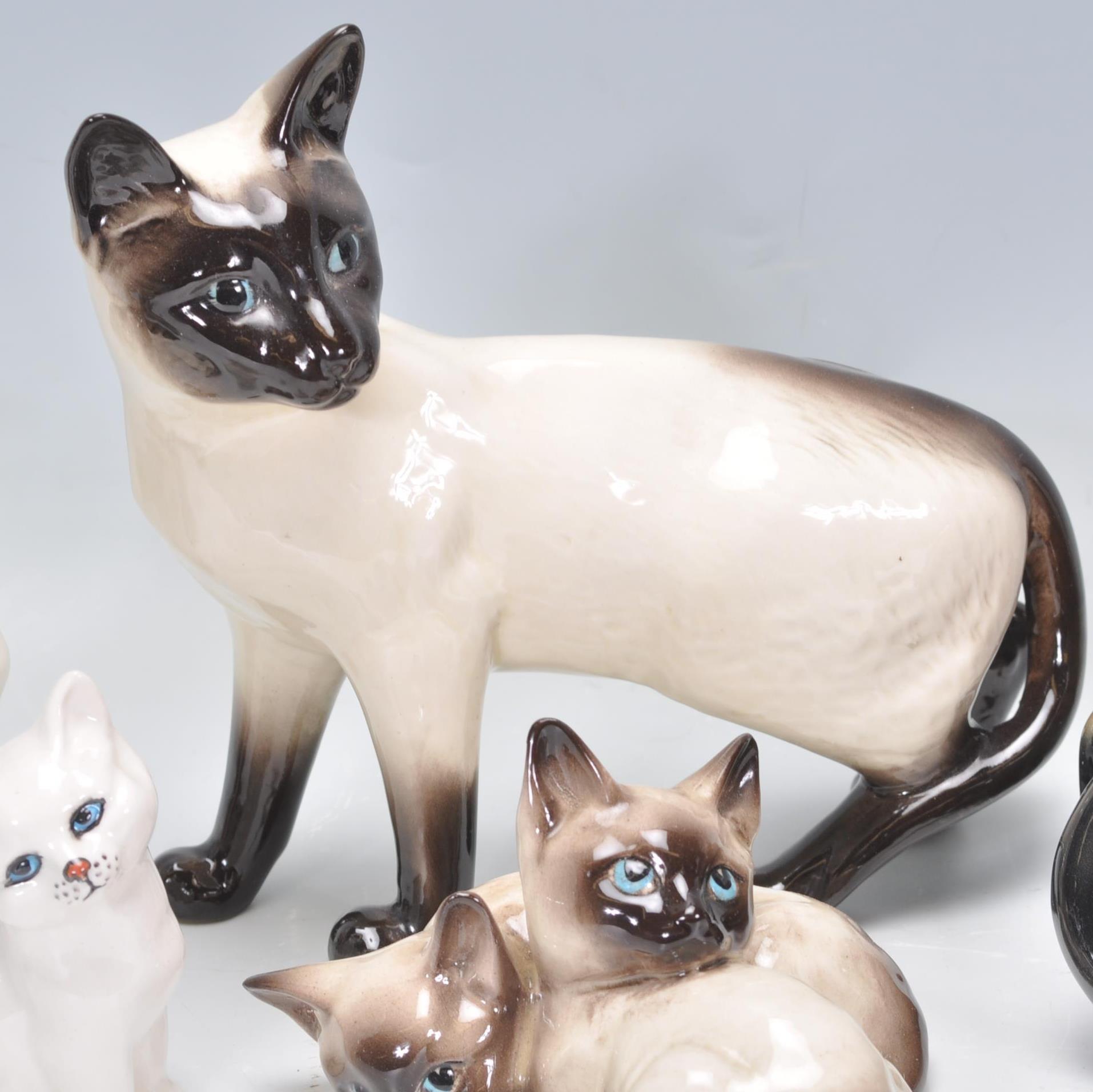 A group vintage 20th Century Beswick ceramic cats to include Siamese cat examples, Persian cats etc. - Image 3 of 11