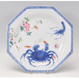 A late 18th Century Chinese porcelain plate of octagonal form hand painted with a blue crab and