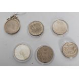 A collection of commemorative crowns to include a millennium five pound, a Bermuda 2012 five