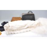 A collection of vintage clothes and handbags to include a white fur jacket with feather scarf