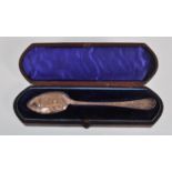 A 19th Century Victorian silver spoon having engraved floral decoration to the bowl and handle,