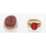 An 18ct gold Birmingham hallmarked Carnelian inset signet ring. Birmingham hallmarks for 1857,