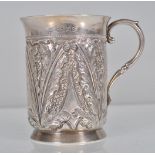 A 19th Century Victorian English hallmarked christening cup having a cylindrical body with flared
