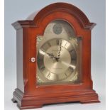 A 20th century mahogany cased Tempus Fugit bracket clock by the London Clock Co having Westminster -