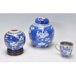 A small group of mixed Chinese ceramic wares dating from the 19th Century to include two prunus