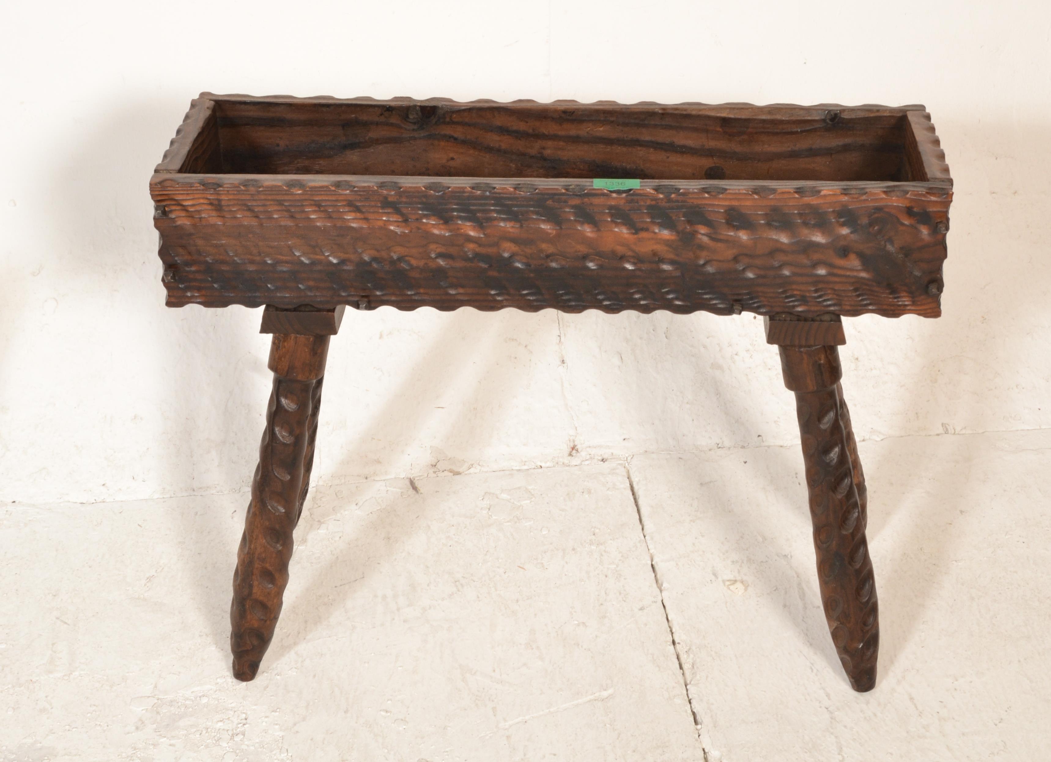 A rustic mid to early 20th century continental German black forest oak planter stand and magazine - Image 5 of 6