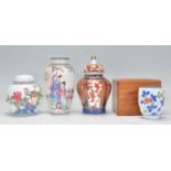 A mixed group of 20th Century Chinese and Japanese ceramics to include a ginger jar hand enamelled