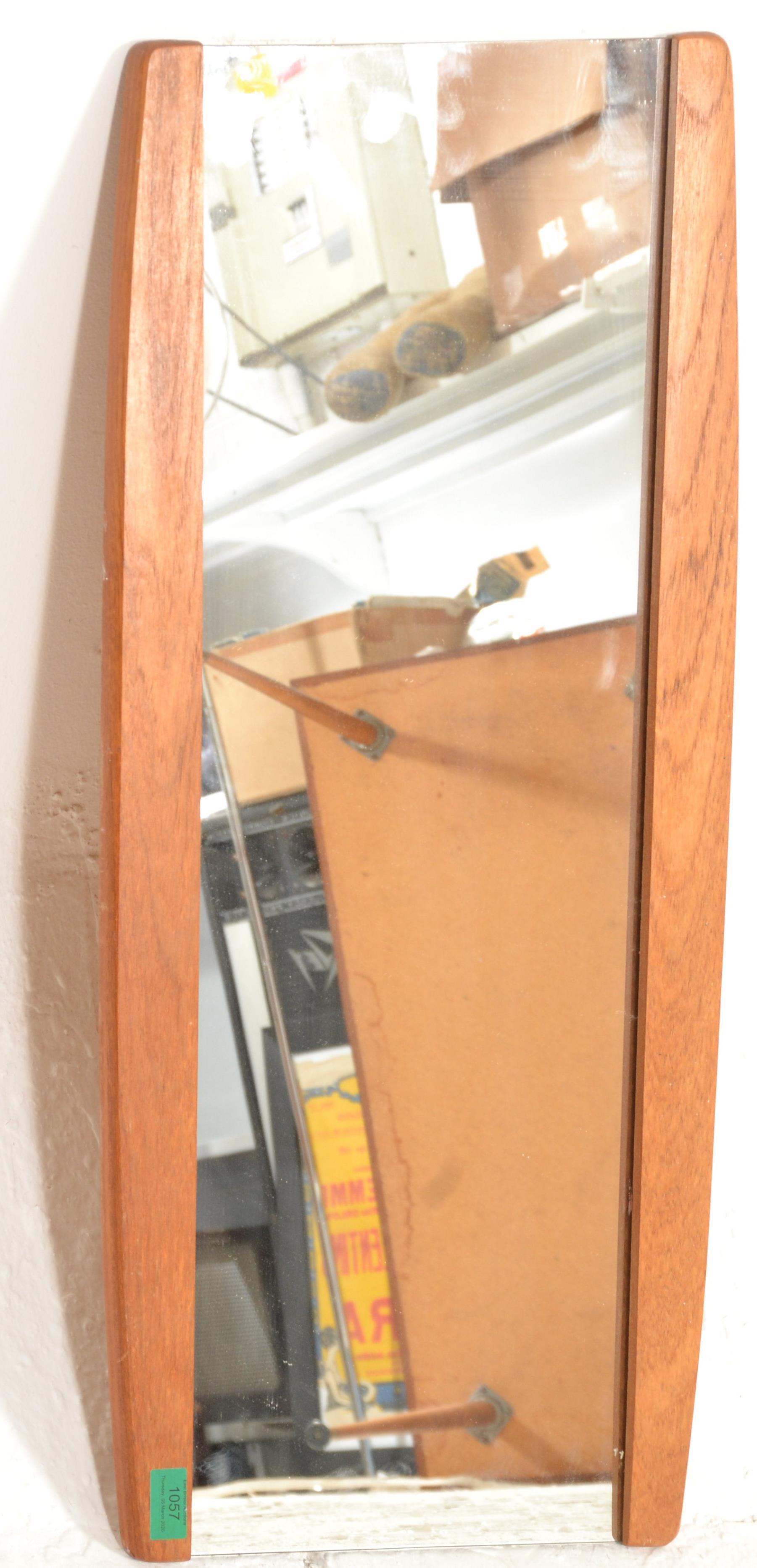 A retro mid century 1970's teak wood angular wall mirror of space age form. The lozenge shaped - Image 2 of 4