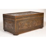 A mid century Chinese carved end of bed chest. The