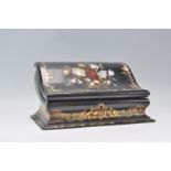 A 19th century Victorian mother of pearl inlaid black lacquer dome top desk tidy box. Of domed