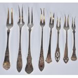 A selection of stamped 830 Norwegian silver toasting forks each having raised floral decoration to