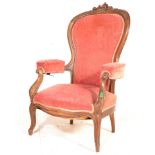 A 19th century French walnut empire reclining  armchair. Raised on cabriole legs with shaped show