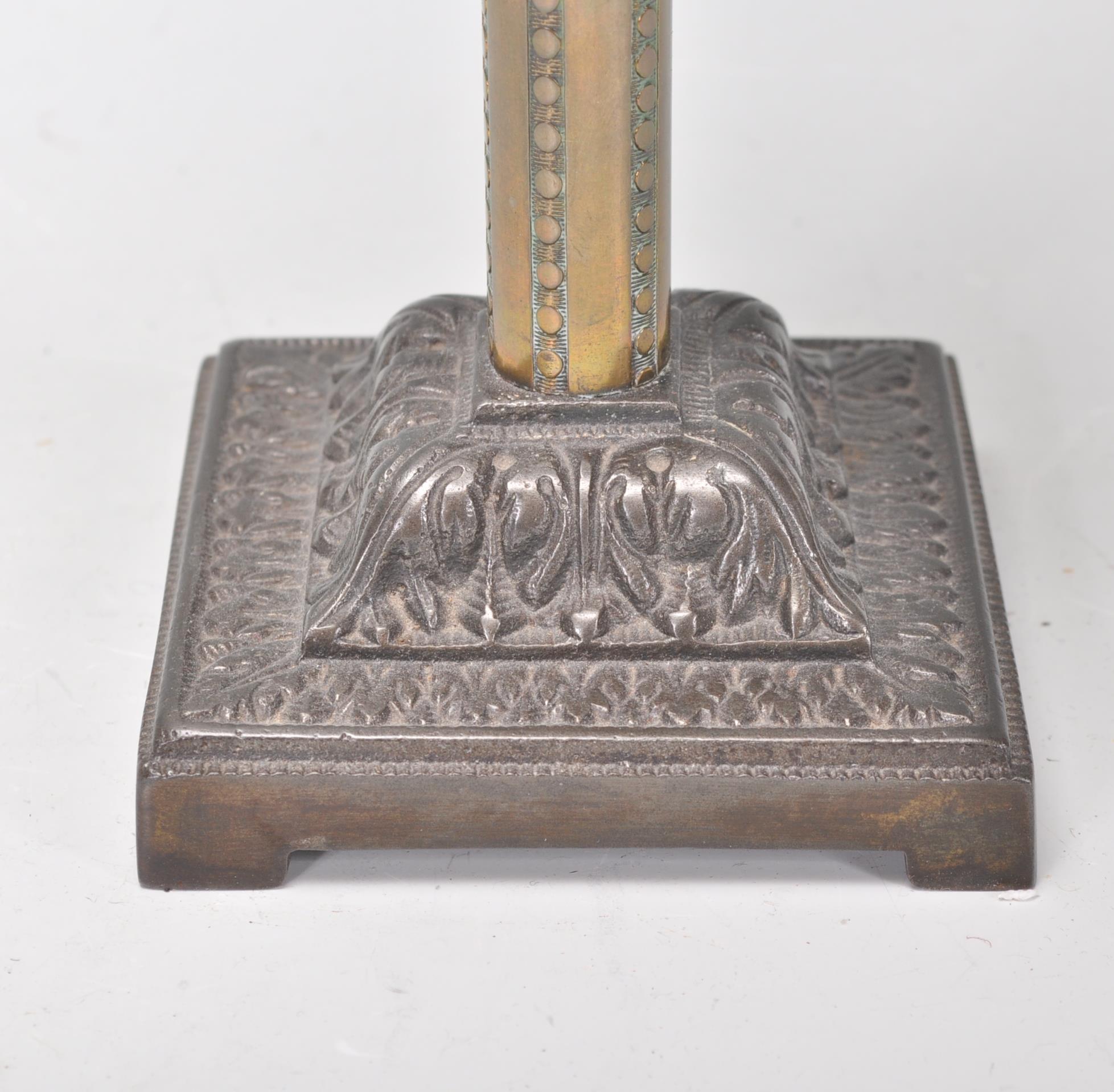 A 19th Century Victorian oil lamp of small proportions being raised on a square stepped base - Image 2 of 6