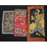 A group of three vintage Liberty printed silk scarves to include a Chinese dragon print scarf, a