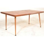 A 1950's retro mid century teak wood parquetry rectangular coffee - occasional table being raised on