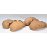 2 pairs of early 20th century leather boxing gloves. Each complete with laces to them and in a