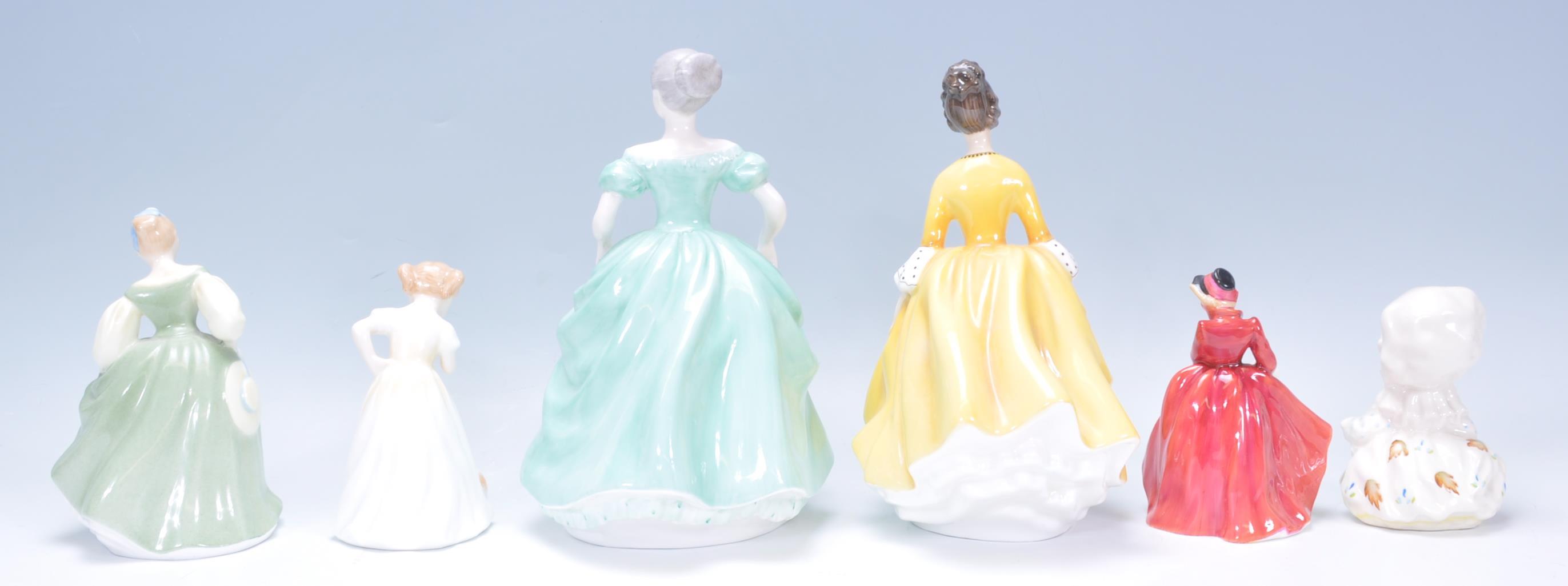 A mixed collection of ceramic figurines to include three Royal Doulton ladies one Emma HN 3208, - Image 3 of 8