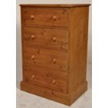 A good quality antique style pine bachelors chest of drawers. Raised on a plinth base with upright