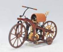 A Franklin Mint precision model of an 1885 Daimler