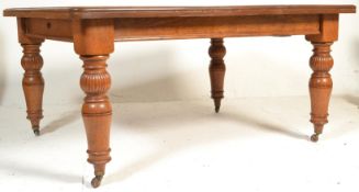 A 19th Century Victorian oak extendable dining tab