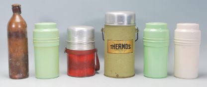 A mixed group of five vintage 20th Century Thermos