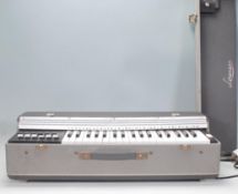 A vintage Lorenzo portable electric keyboard with