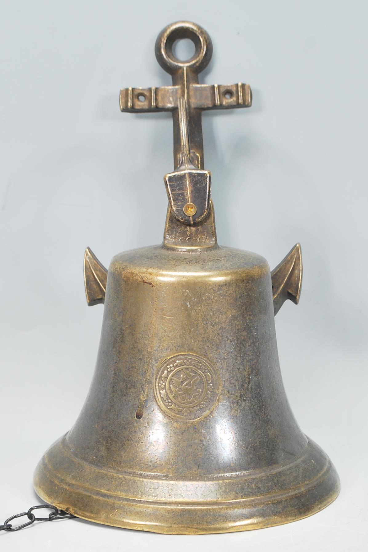 A contemporary novelty brass ships bell / front do