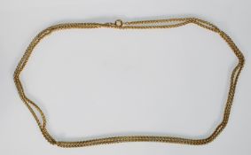 A 20th Century brass guard watch chain with woven