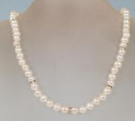 A ladies necklace made from freshwater pearls held