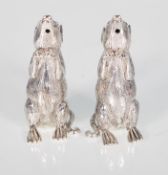 A pair of silver plated novelty salt and pepper co