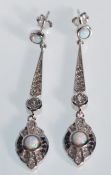 A pair of stamped 925 silver ladies drop earrings.