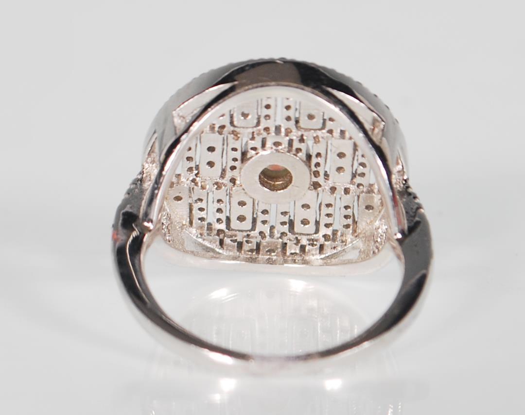 A stamped 925 silver ring. The centre stone is an - Image 4 of 6