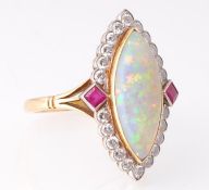 A French 18ct gold opal diamond and ruby ring. The