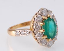 A French 18ct Gold Emerald & Diamond Cluster Ring