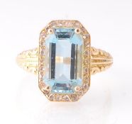 An 18ct Gold Aquamarine & Diamond Ring