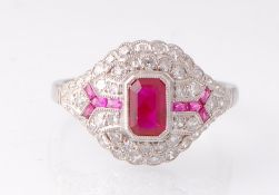 A white metal Art Deco ruby and diamond bombe ring