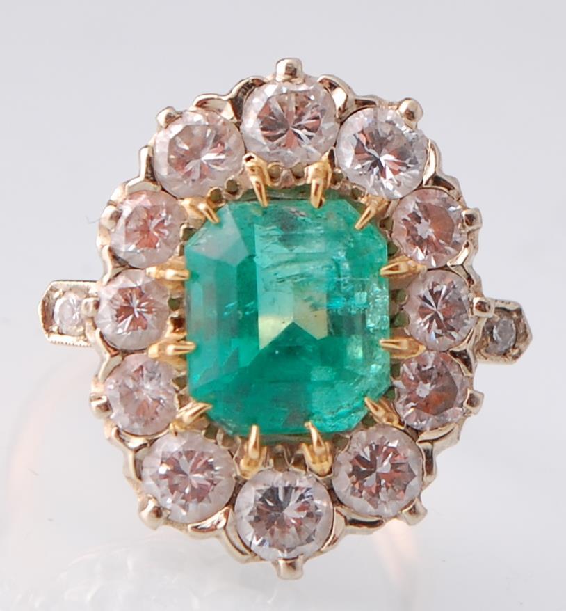 A French 18ct Gold Emerald & Diamond Cluster Ring