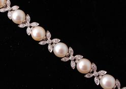 A French signed Sterle Paris cultured pearl and di