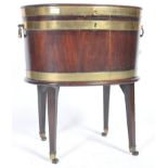 19TH CENTURY MAHOGANY AND BRASS WINE COOLER ON STA