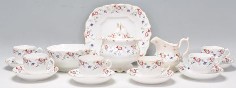 A 19th Century Victorian china coffee service having white ground with blue, red and green floral
